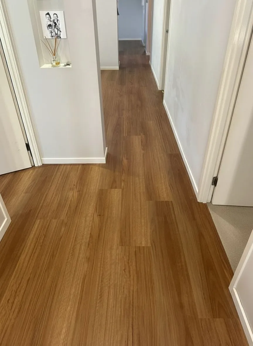 Brown timber-look vinyl flooring available now from Beare Flooring.