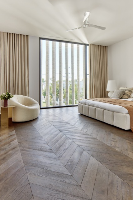 Brown chevron timber flooring available now from Beare Flooring.