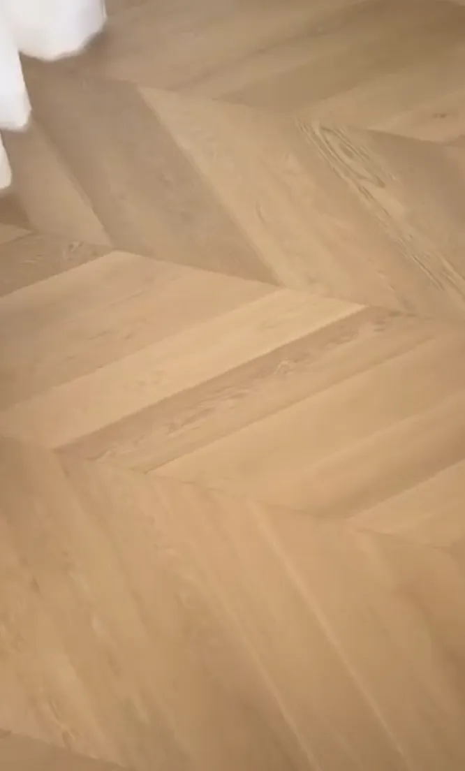 Natural wood herringbone flooring available now from Beare Flooring.