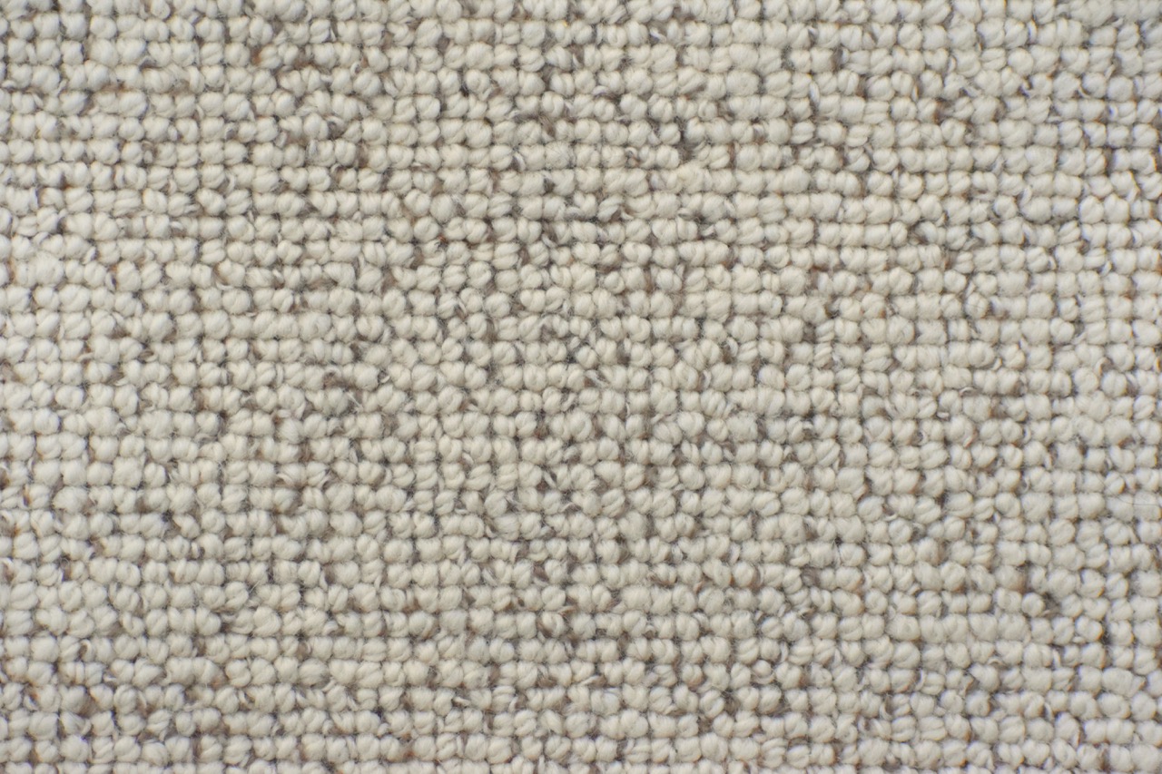 Cream loop pile carpet available now from Beare Flooring.