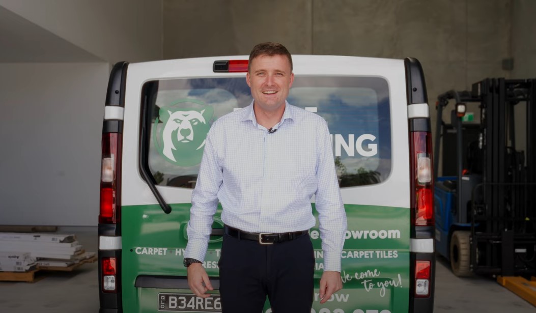 William Beare of Beare Flooring standing in front of mobile showroom van.